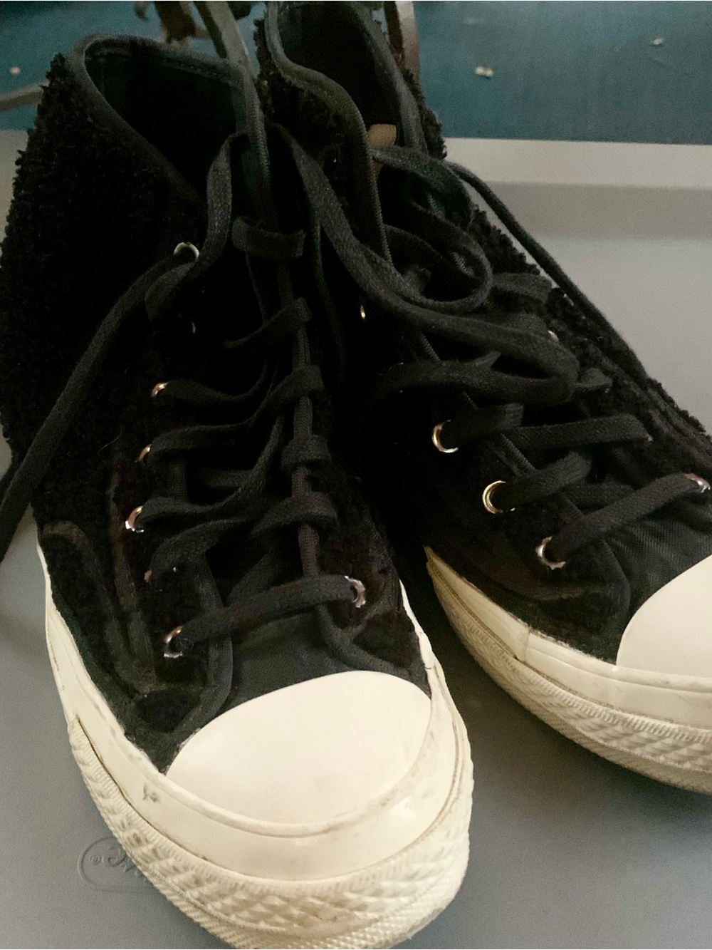 Chuck Taylor’s Sherpa ankle high sneakers
